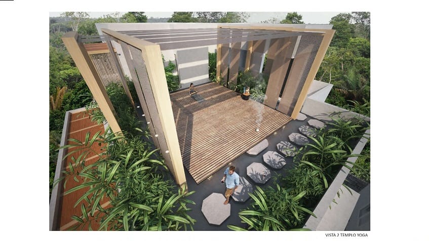 Top view of the square structure of the yoga temple and woman meditating at Erena Mindful Apartments.
