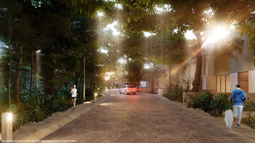 Houses on the street, woman running through the park in Edena Tulum