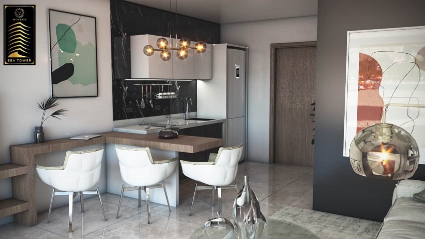 Cocina en blanco y negro con barra de desayuno en Menesse Sea Tower