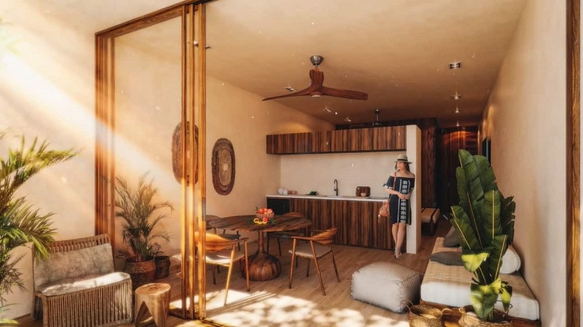 Kitchen with dining room table overlooking the terrace in Bacab Tulum