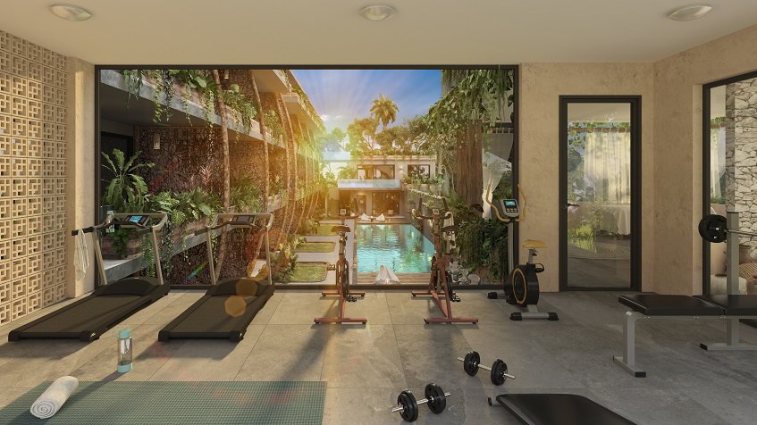 Gimnasio con vista a la alberca en Xamira Tulum