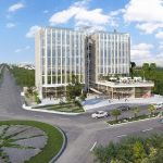 Façade of the Humana Workcenter business building by traffic circle