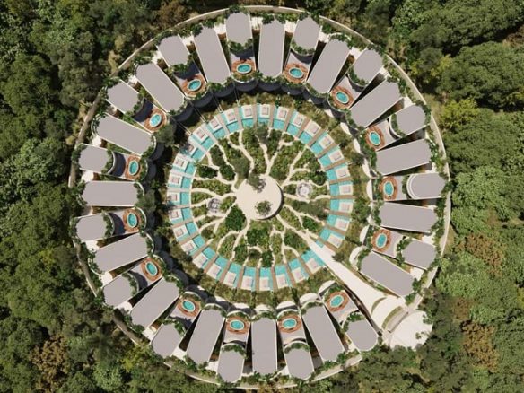 Vista superior del área residencial circular con parque en el medio en Mistiq Villas Tulum