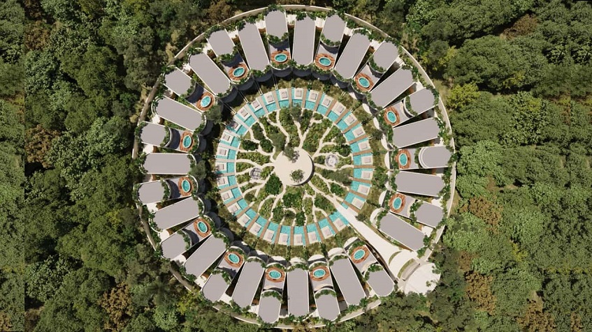 Vista superior del área residencial circular con parque en el medio en Mistiq Villas Tulum