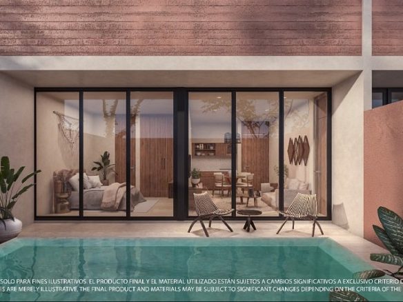 Piscina con terraza privada con mesa pequeña y dos ventanas con puertas corredizas en Peregrina Tulum