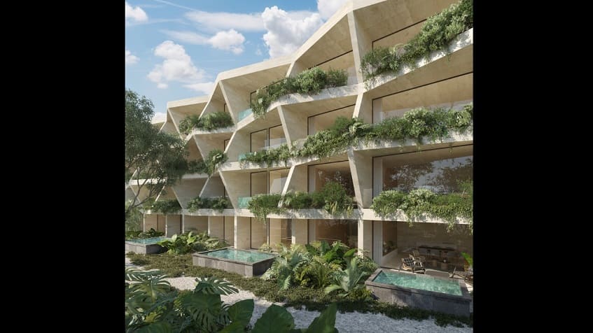 Fachada de forma futurista de edificio residencial con vegetación en Mistiq Premium