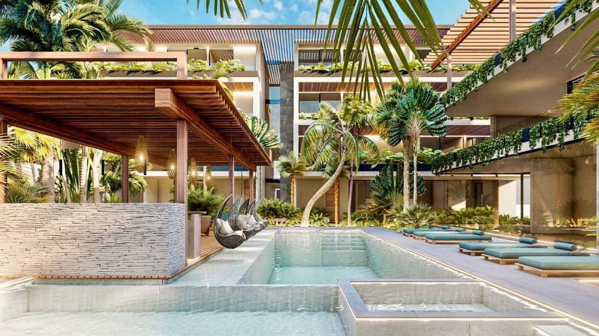 Terraza de la piscina, sala de estar y ventana con puerta corrediza en Nygma Tulum
