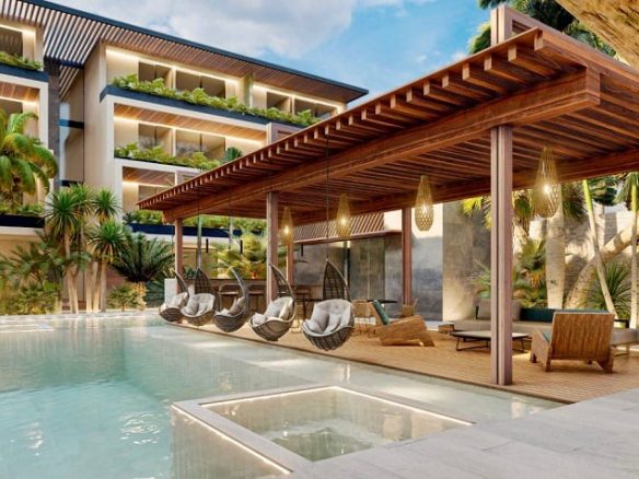 Swimming Pool and swings hanging under pergola at Nygma Tulum
