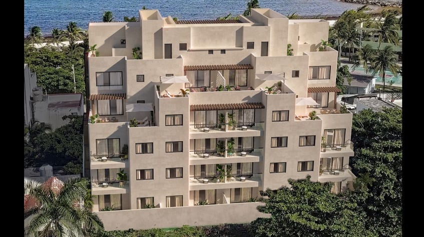 Edificio residencial y vista al mar en Porto Blu Puerto Morelos