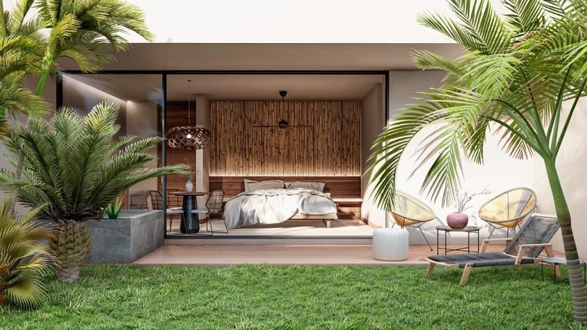 Dormitorio y terraza jardín en Nygma Tulum