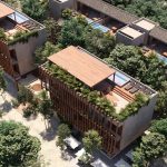 Aerial view of two residential buildings with jungle facilities at Homa Kah Tulum