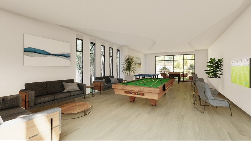 Large game room with pool table in the middle in Bali in Riviera Maya