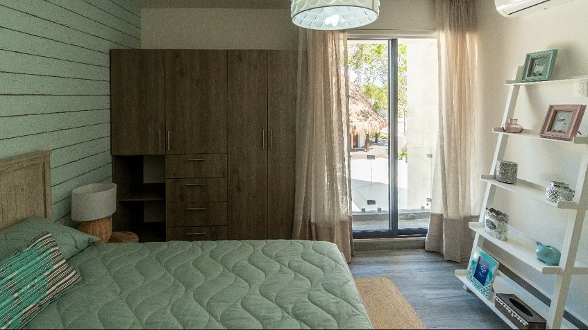 Bedroom with large closet next to the window in Recinto House | Bali in Riviera Maya