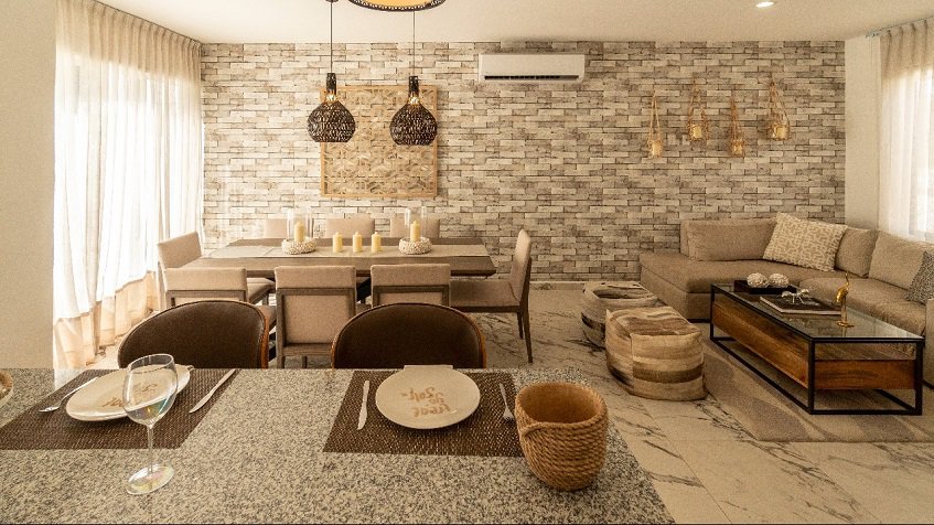 Breakfast and dining table by the large window at Recinto House | Bali in Riviera Maya