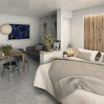 Interior de apartamento con mesa de comedor y cama en Blanko 54 Playa del Carmen
