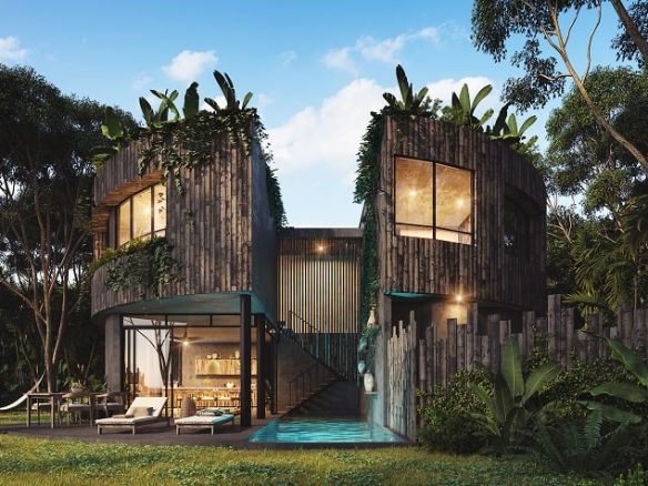 Fachada de edificio residencial redondo con escaleras en el medio, alberca, terraza, hamaca en Esencia Villas Tulum
