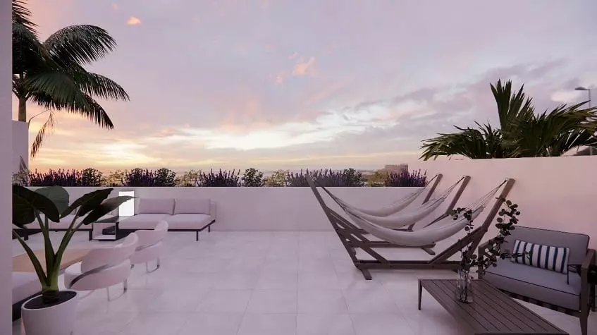 Rooftop hammocks, sunrise lights in the sky at South 307 Condominiums
