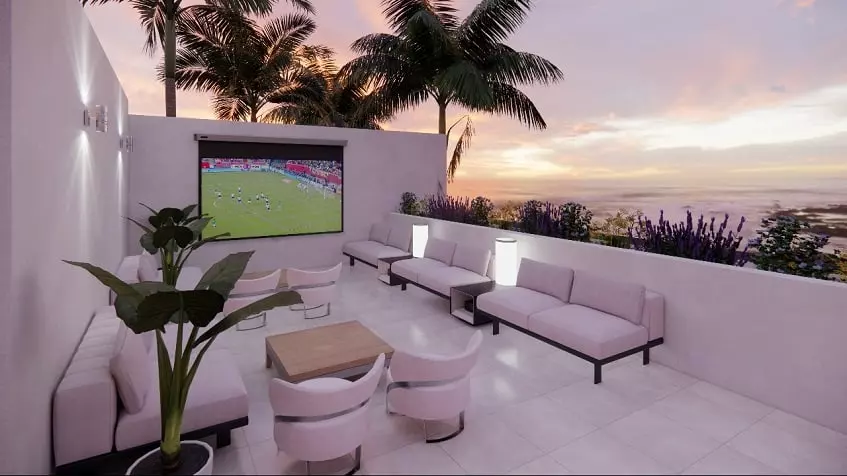 Outdoor movie set, sunrise behind palm trees in South 307 Condominiums