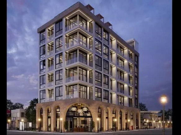 Five-story residential building after sunset, corner view at Ocean Breeze Playa del Carmen