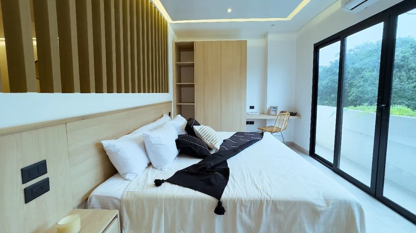 Interior recámara con cama en Macondo Tulum
