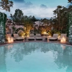 Circular pool and sundeck at Mayaliah Tulum Hotel & Residences
