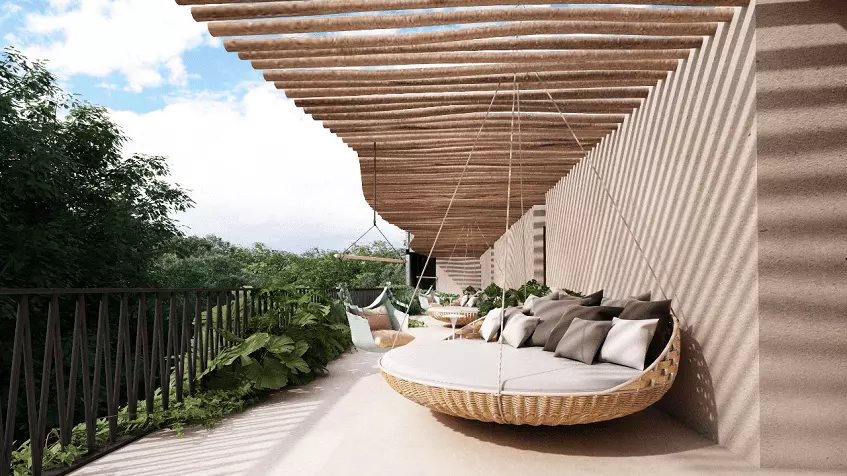 Amplia terraza con sofás colgantes en Amazona 518 Tulum