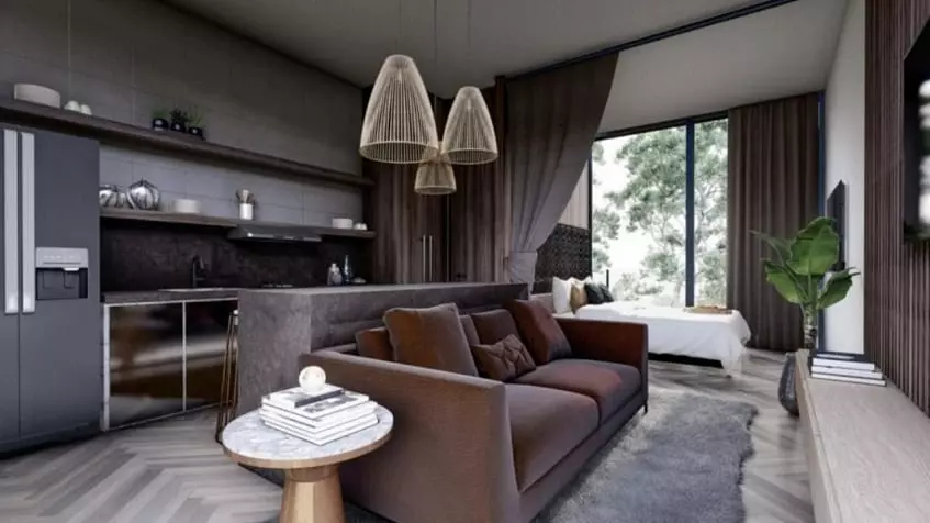 Condominio estudio con un sofá al lado de una cocina, cama junto a una ventana en Soul Living Tulum