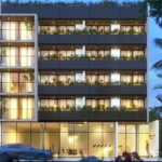 Façade d'un immeuble résidentiel et une voiture traversant le quartier de la plage