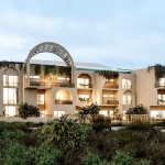 Rear facade of residential building with balconies, garden in Xiib Kaab Tulum