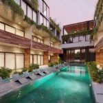Illuminated ground-floor pool with sundeck at Kateen Tulum