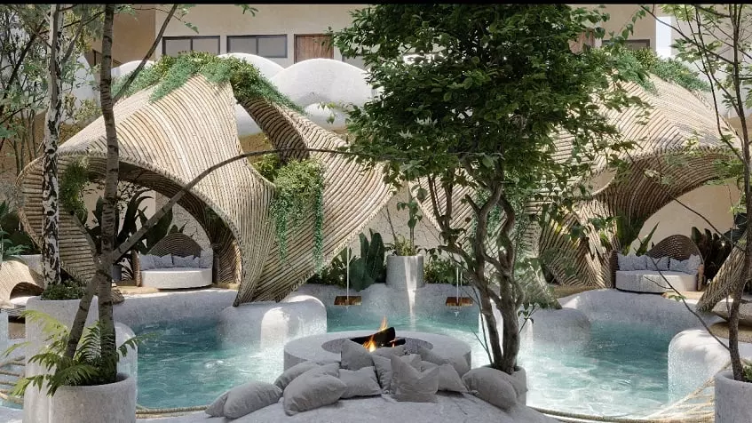 Área de piscina con fogón y algunos cojines blancos, modernas palapas de bambú en Kaan Kuja