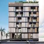 Façade d'un immeuble résidentiel avec balcons et une voiture passant par la Torre 48 Playa del Carmen