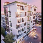 White residential building and street view at Ocean Life Playa del Carmen