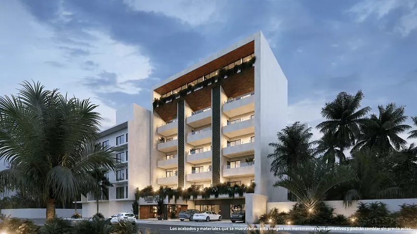 Fachada de edificio residencial blanco con balcones en Studio 34 Playa del Carmen