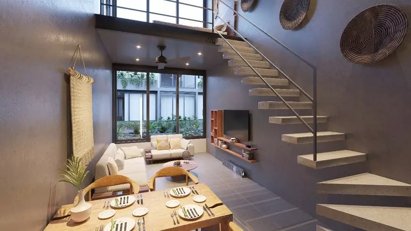 Mesa de comedor y sala de estar, escalera que sube en Kateen Tulum