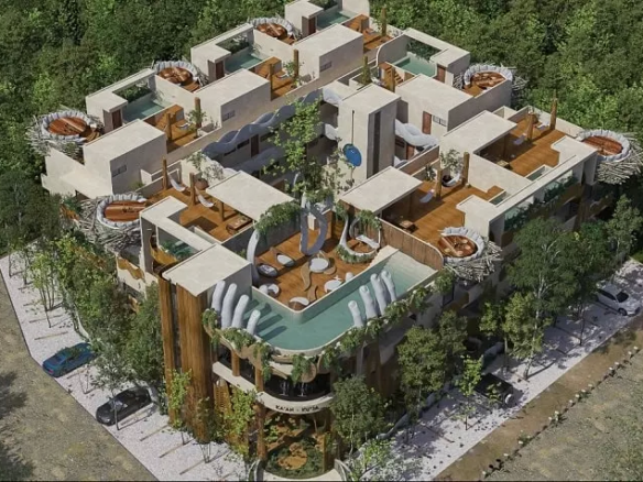 Vista de un edificio residencial con terrazas privadas en la azotea y área de piscina en Kaan Kuja