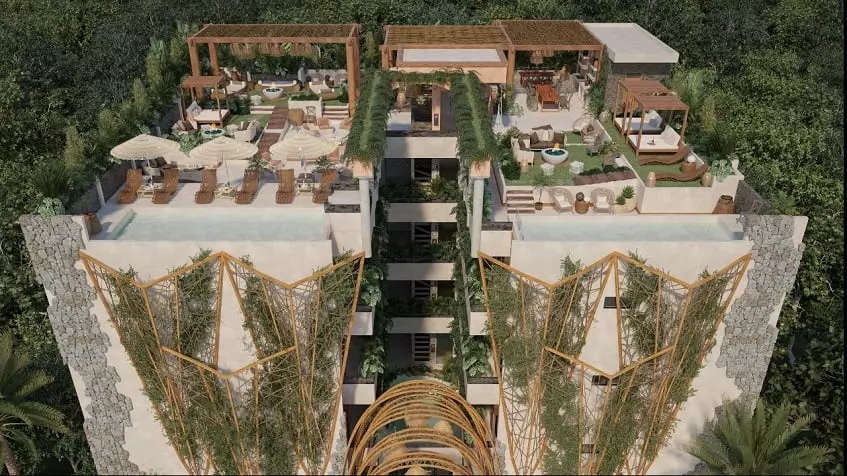 Roof Garden de dos edificios residenciales conectados con puentes en cada piso en Ocean Condos Tulum