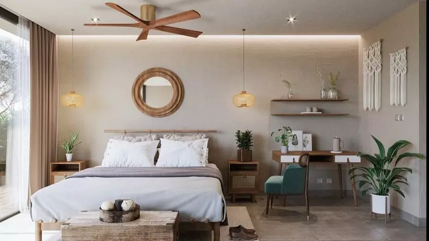 Recamara con una cama junto a un escritorio de oficina y una silla en Ocean Condos Tulum