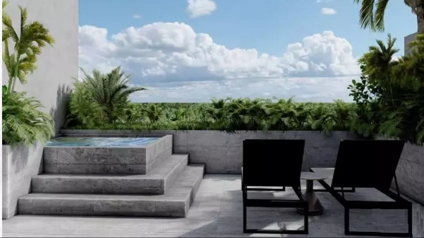 Terraza con piscina profunda en la azotea con vista a la jungla en Quartier 75 Playa del Carmen