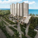 Residential building next to a street surrounded by greenery in Antilia Cozumel