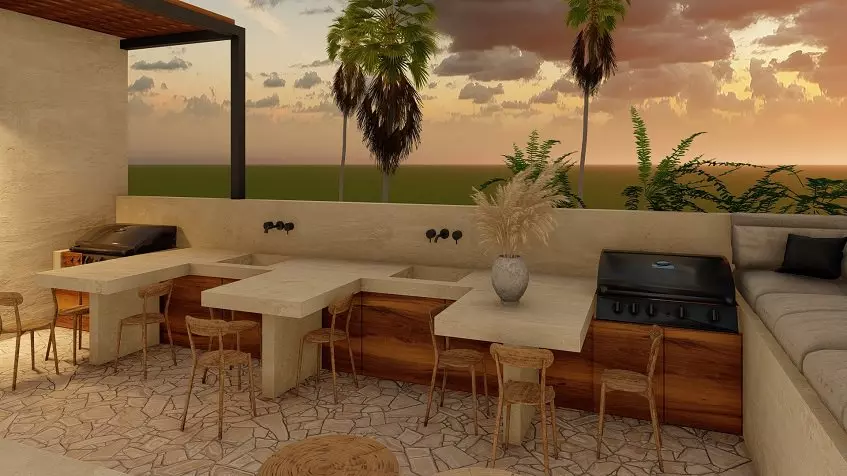 Un area de asadores con sillas y plantas en Eden Playa del Carmen