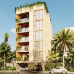 Façade d'un immeuble d'appartements avec des voitures garées à Eden Playa del Carmen
