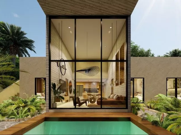 Jardin avec piscine au rez-de-chaussée devant une fenêtre à double hauteur à Casa Chechen Tulum