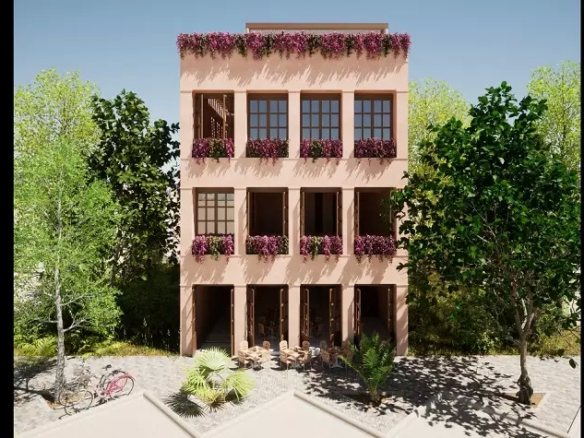 Exterior façade of pink building in Anemona Tulum