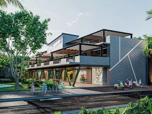 Storefronts with bicycles and motorcycles parked at Areia Plaza Tulum
