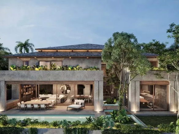 Fachada de la parte trasera de una casa con piscina en Muuyal Tulum