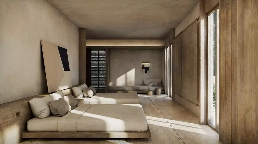 Recamara principal con 2 camas, almohadas y una cabecera en Candela Tulum
