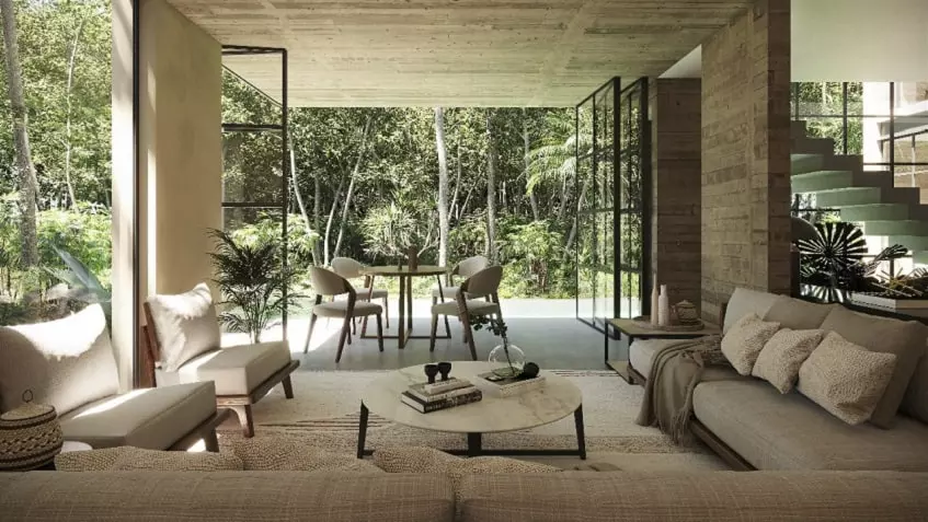 Salon spacieux avec jardin à l'arrière de la Villa Amore