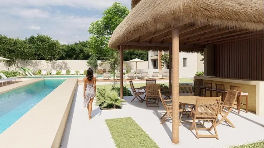 Alberca con palapas e Sea Lofts Cozumel