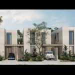 Facade of 3 houses with parked cars at Casa Aurora Tulum